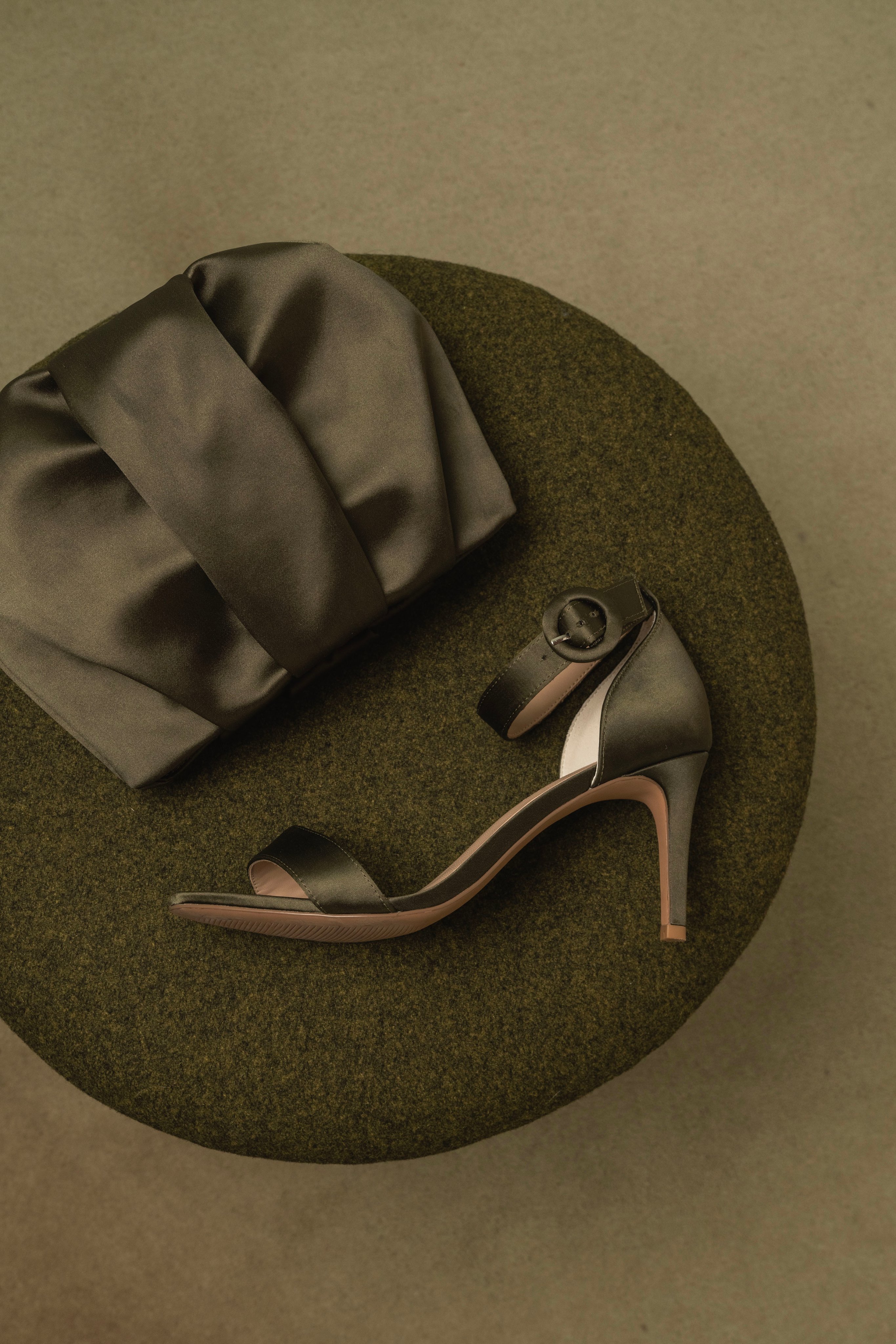 Satin scarf and khaki heeled sandals.
