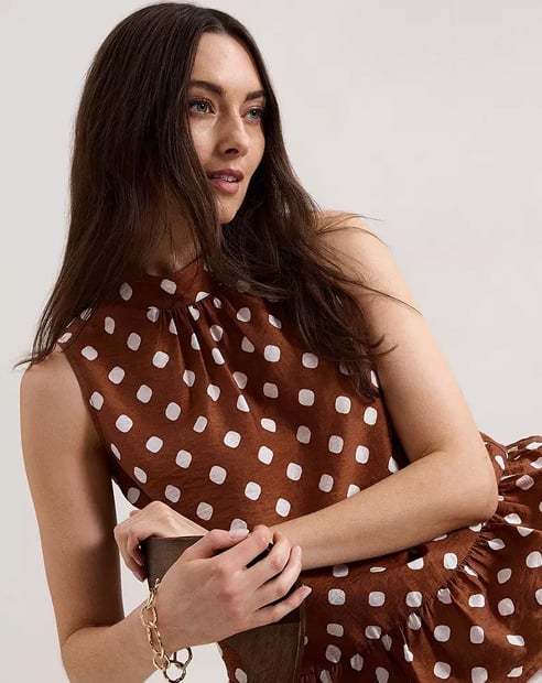 Woman in Phase Eight Polka Dot top