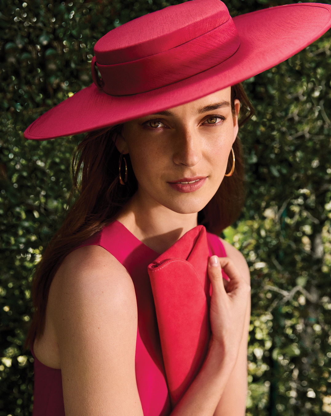 Woman wears Phase Eight fascinator