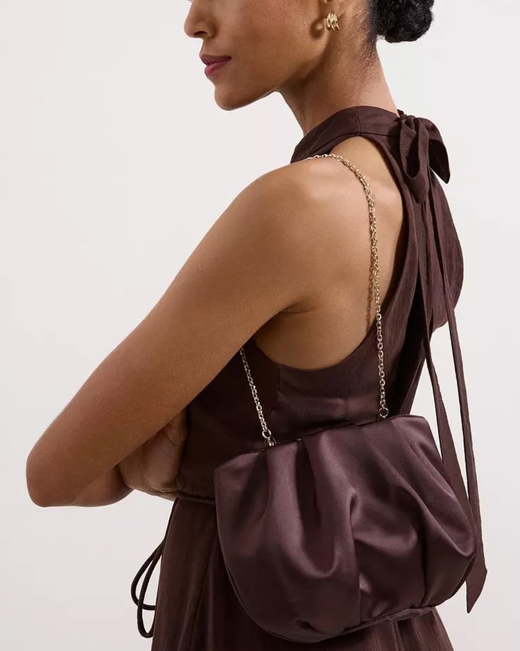 A Hobbs satin cloud clutch bag and accessories.