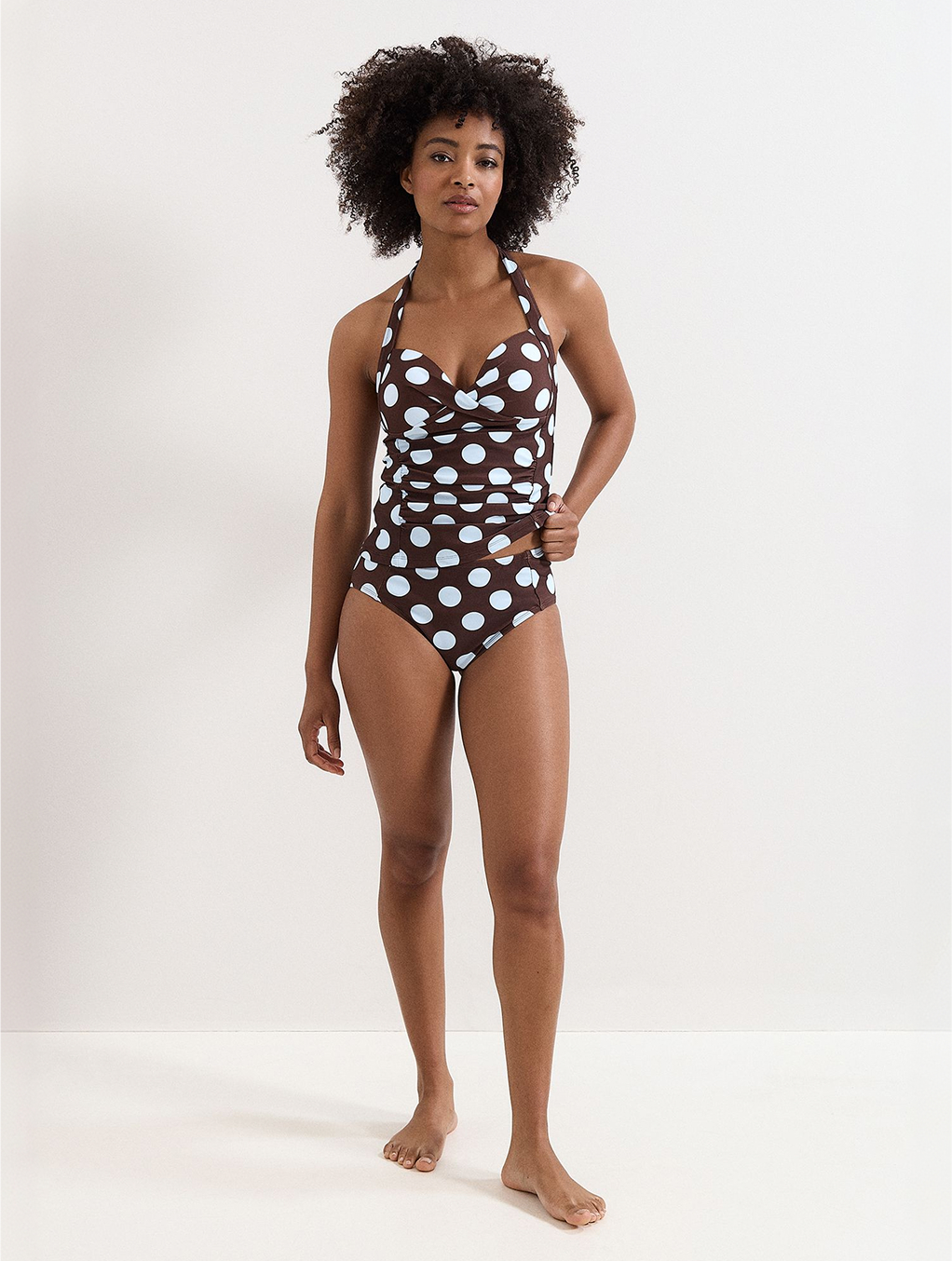 Woman wearing Phase Eight holiday styles