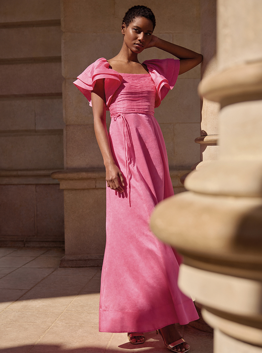 Woman wearing Phase Eight dress