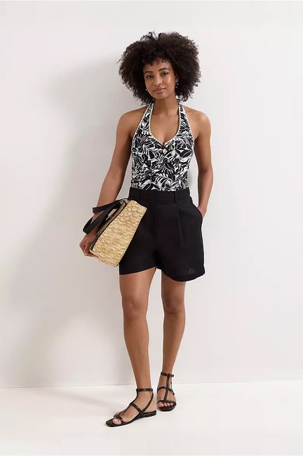 Woman wearing Phase Eight holiday styles