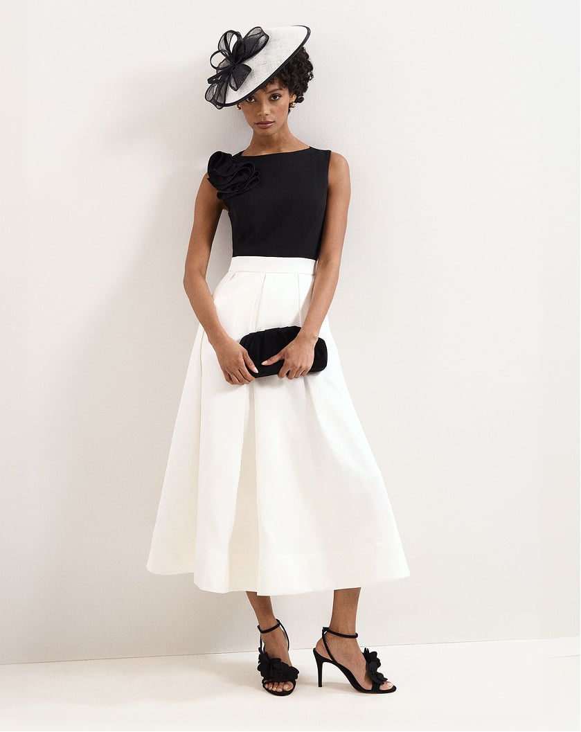 Woman wearing Phase Eight dress