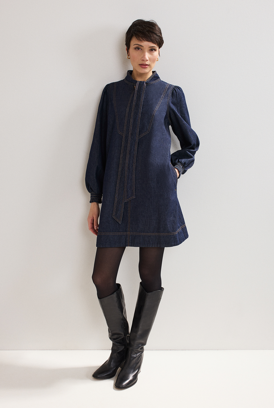 Woman wearing Phase Eight mini dress