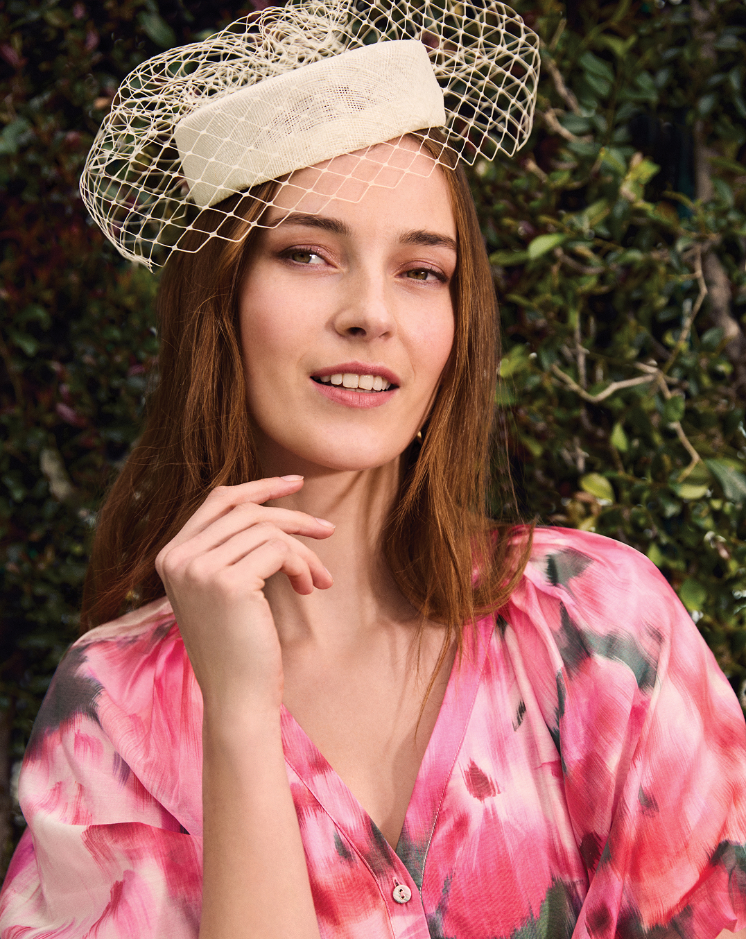 Woman wearing Phase Eight fascinator