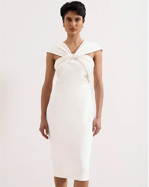 woman in white Phase Eight dress