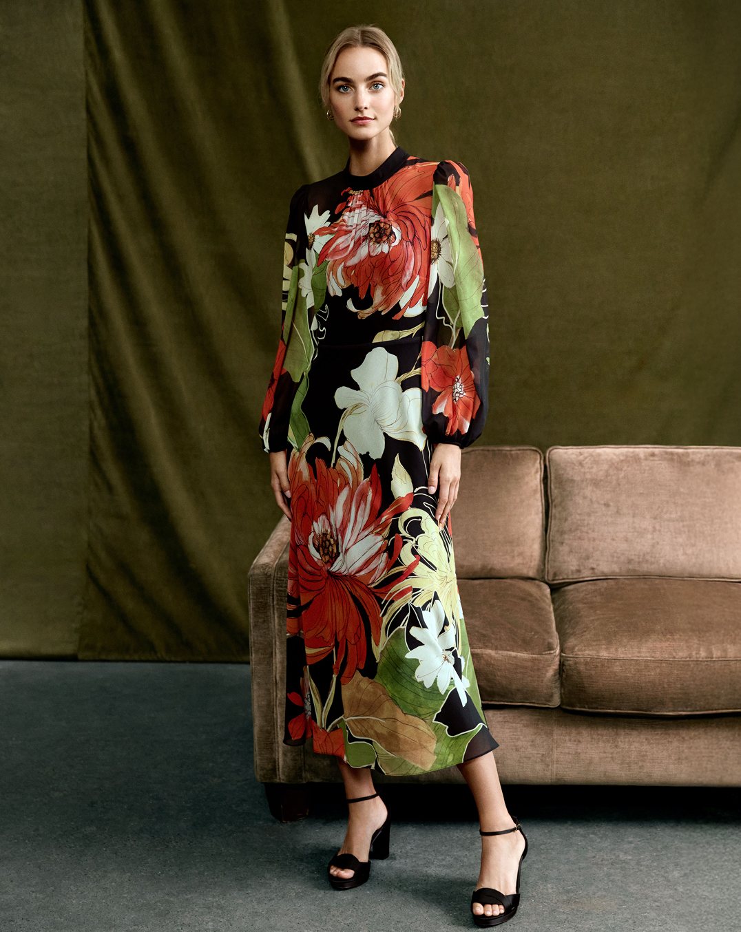 Woman wearing Phase Eight floral midi dress