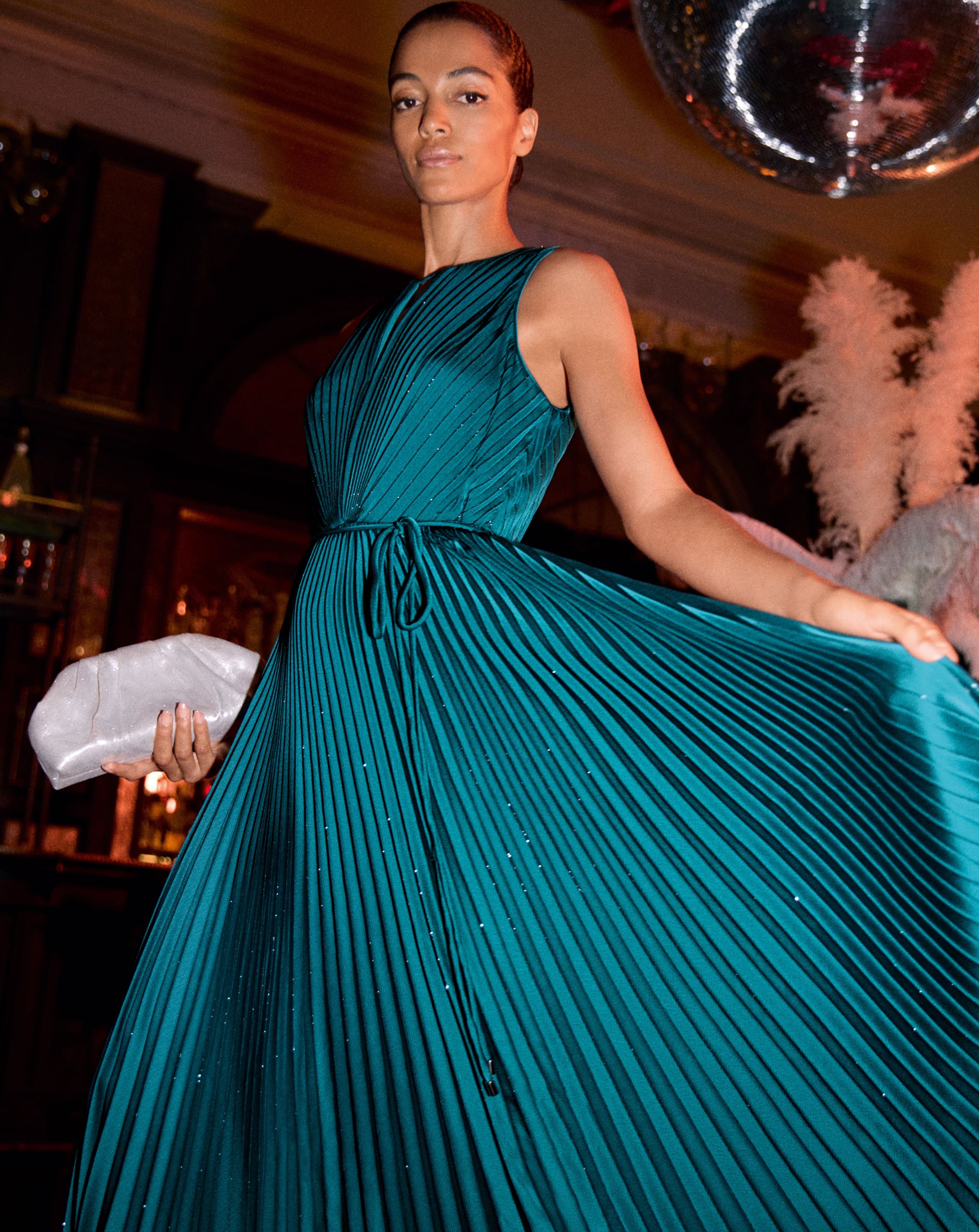 Woman wearing Phase Eight maxi dress