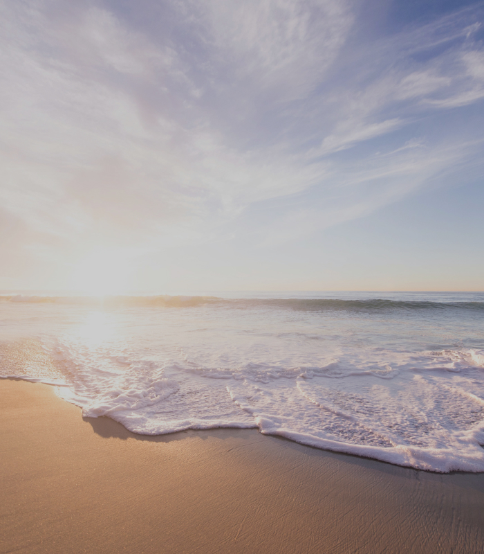 Waves rolling in on the sand