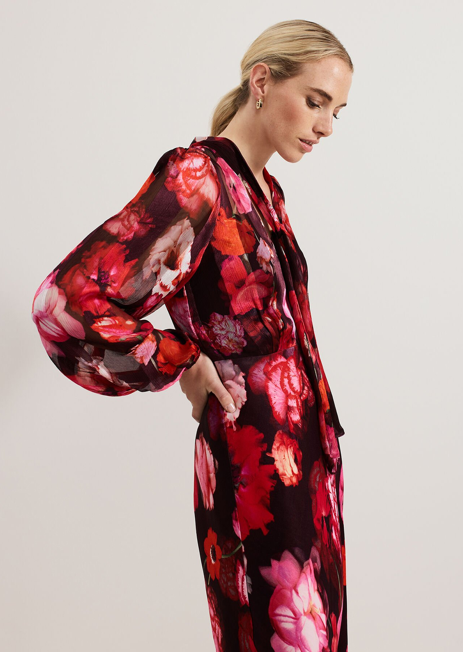 Woman wearing Phase Eight races outfit