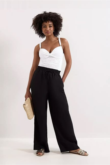 Woman wearing Phase Eight holiday styles