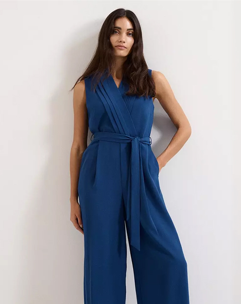 Woman in navy Phase Eight Jumpsuit