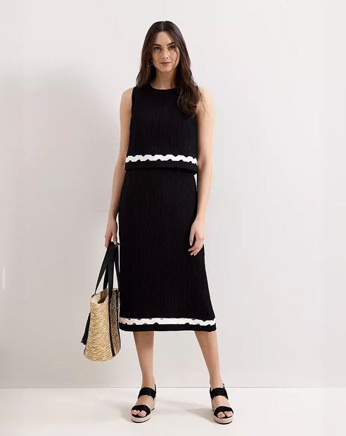 Woman in Phase Eight dress