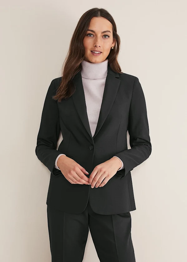 Woman wearing Phase Eight black suit jacket