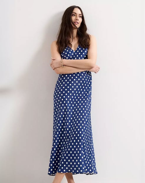 woman in Phase Eight polka dot dress