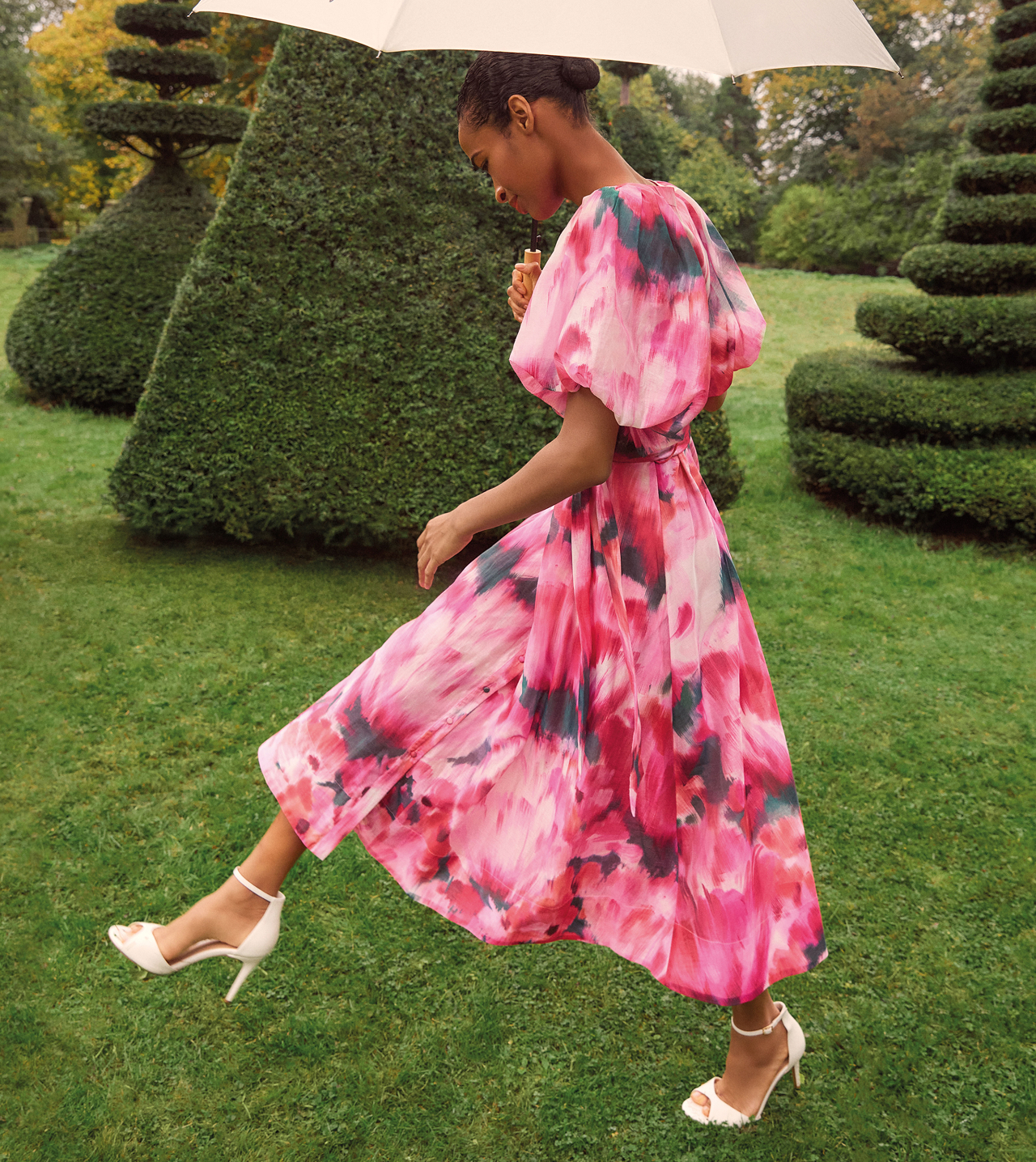 Woman wearing Phase Eight dress