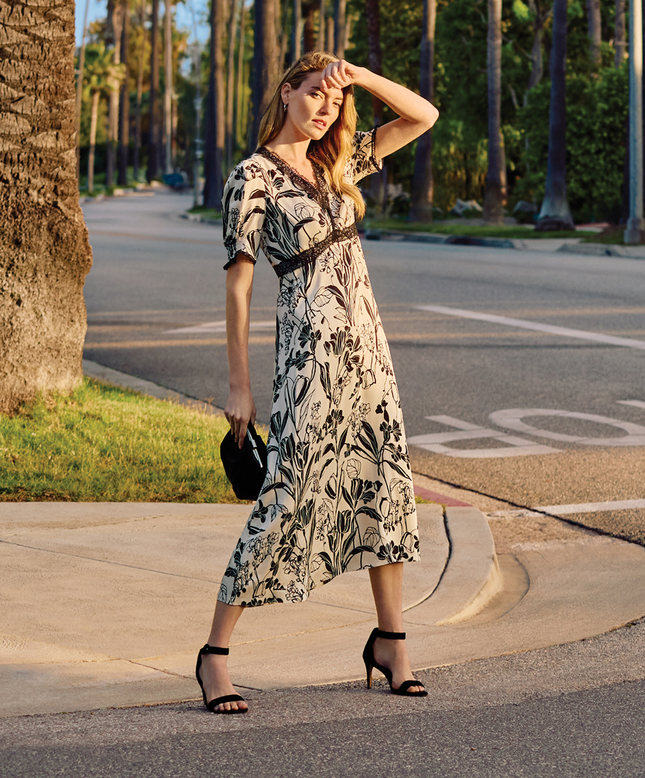Woman wearing Phase Eight dress