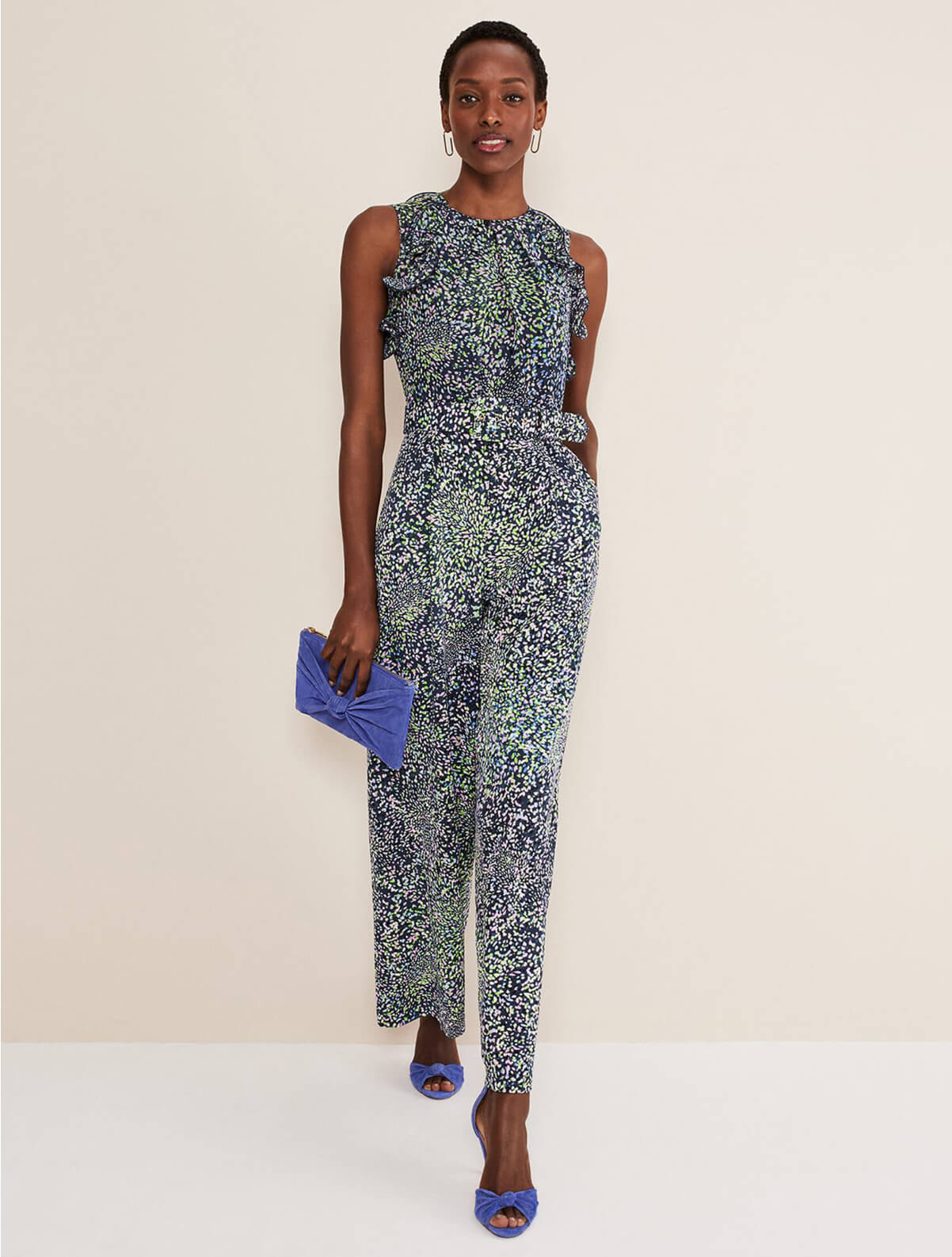 Woman wearing ditsy print jumpsuit