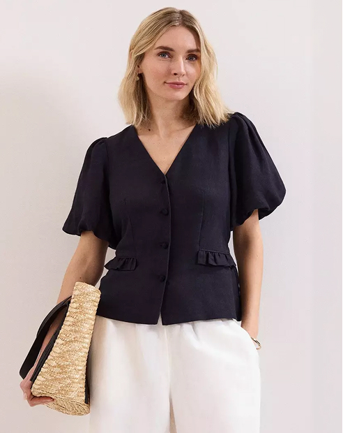 Woman in Phase Eight linen blouse
