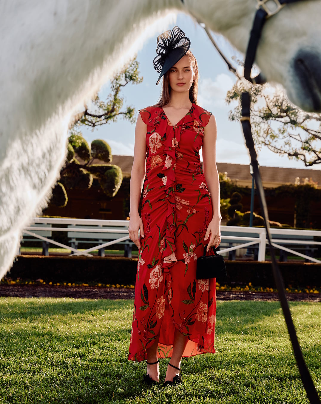 Woman wearing Phase Eight event dress